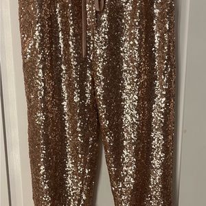 Gold sequin joggers.